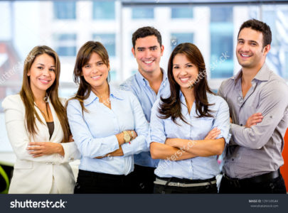 stock-photo-happy-business-team-with-arms-crossed-at-the-office-129169544
